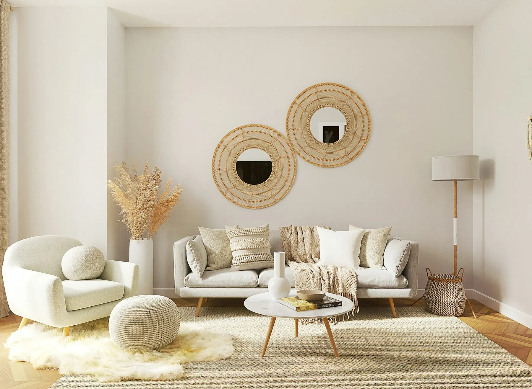 Salon blanc et beige avec miroirs en rotin, fauteuil bouclette et tapis moelleux